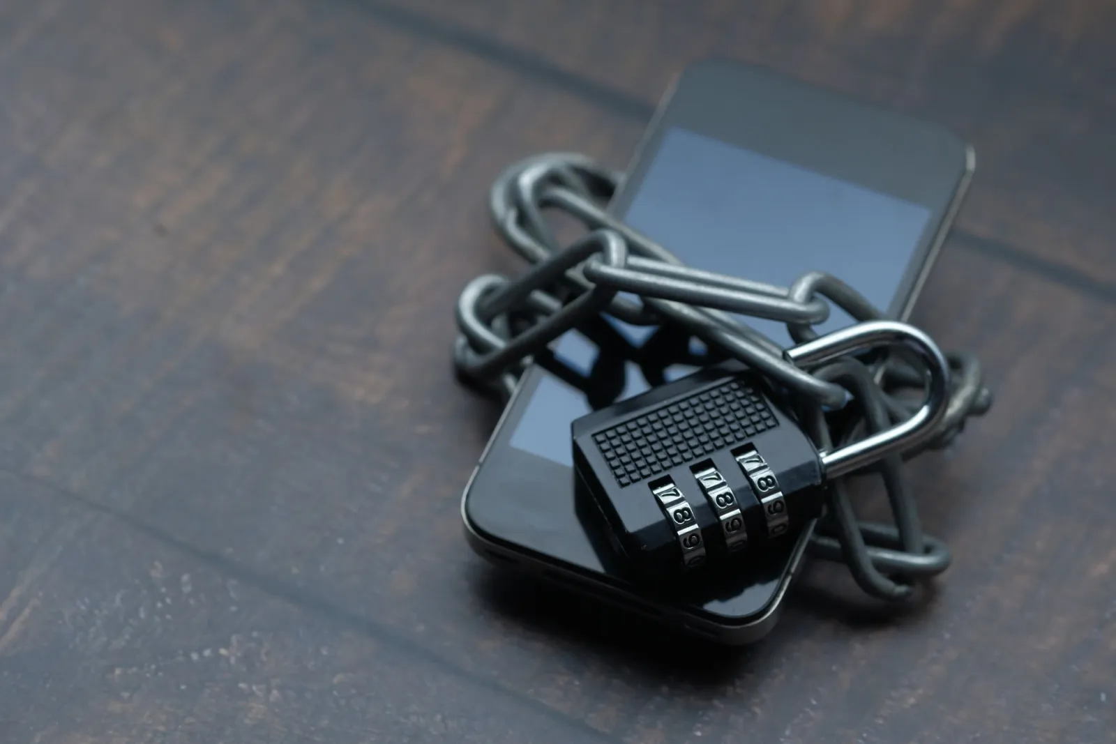 Smartphone secured with a chain and a combination lock