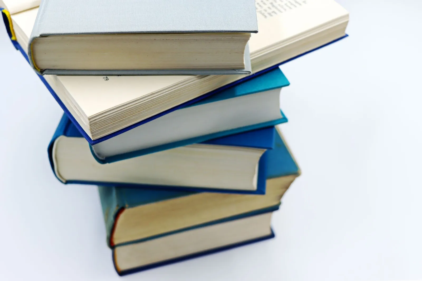 Stack of bound books with blue covers